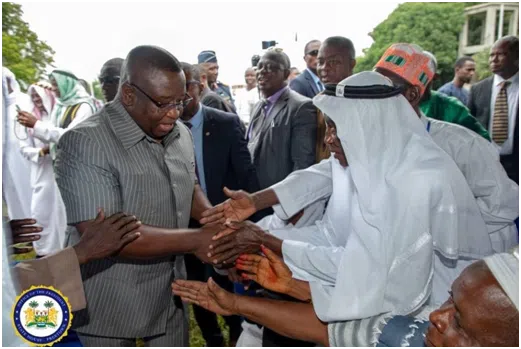 President Bio Welcomes Home Pilgrims from Mecca at State House