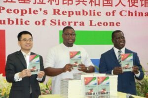 Ambassador Wang Qing and Hon. Foreign Minister Timothy Musa Kabba and Former Foreign Minister Prof. David J. Francis at the launching ceremony of a China-Sierra Leone Friendship book. | The Calabash Newspaper