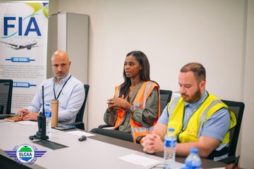 SLCAA's DG, Musa Yeroh Barrie (in the middle), speaking at an engagement with TUI Airways officials