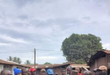 M.R. Distilleries Backs Old Wharf Community with Materials, Funds for Road Construction