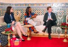 SLCAA DG Advances Aviation Safety Agenda at ICAO 2026 Global Symposium in Marrakech Five diverse speakers seated on a patterned sofa in a decorated room, engaged in a panel discussion with lanyards, flowers, and red carpet.