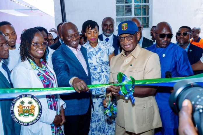 President Dr. Julius Maada Bio joins the Executive Chairman of NP (SL) Limited, Dr. Mohamed Babatunde Cole, at the commissioning of the modern Burns Unit at Connaught Hospital in Freetown.