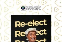 Tuma Adama Jabbi Seeks Re-Election as SLBA President, Pledges to “Secure the Gains” Campaign poster for Tuma Adama Jabbi running for SLBA president, featuring a judge in gown and a bold 'Re-elect' backdrop.