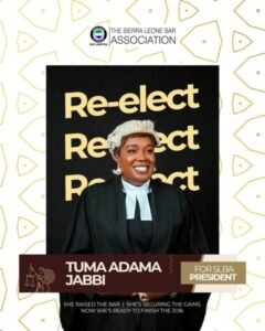 Campaign poster for Tuma Adama Jabbi running for SLBA president, featuring a judge in gown and a bold 'Re-elect' backdrop.