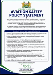 Poster: Aviation Safety Policy Statement from the Government of Sierra Leone, featuring the national crest and a list of safety commitments.