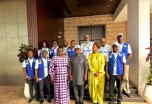 Stats SL Completes Nationwide Cartographic Mapping Exercise Ahead of 2026 Census Group of men and women wearing blue census 2026 vests posing on steps outside a building.