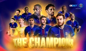 800x480-3-1 | The Calabash Newspaper Promotional banner for Paris Saint-Germain with players in blue kits and bold gold 'THE CHAMPIONS' text, plus 1XBET logo.