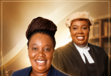 Tuma Adama Jabbi Esq. Seeks Re-election, Campaign on Record of Reforms, Welfare & Legal Excellence Two smiling Black women in professional attire pose together, one in a blue blazer and the other in a judge's robe in a warm, gold-toned background.