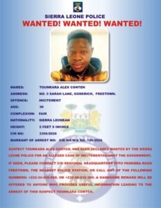 Sierra Leone Police wanted poster with a mugshot of Tounkara Alex Conteh and listing: address No. 5 Sarah Lane, Goderich, Freetown; offence incitement; age 30; height 5'9"; nationality Sierra Leonean; CIR No. 3356/2026; Warrant of Arrest No. CID HQ W/A No. 109/2026; red warning text and contact instructions for tips.