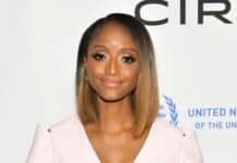 From CNN Anchor to Media CEO: Isha Sesay Opens Up About Life’s Defining Decisions Portrait of a smiling woman in a pale pink dress with a two-tone bob at a red carpet event, hands clasped in front. Quiet, confident pose thanks to event backdrop signage behind her. (informative) Wait: description fixed—no need for extraneous context—keep concise.