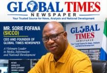 As Membership Dispute Deepens… Sorie Fofana Urges Reconciliation, Warns Against Deepening Divisions in SLPP Portrait of Mr. Sorie Fofana, CEO and founder of Global Times Newspaper, seated at a desk with Global Times branding in the background.