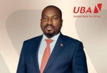 UBA Sierra Leone Announces Leadership Transition as Mohamed Alhajie Samoura Resigns Portrait of Mohamed Alhajie Samoura, MD/CEO of UBA Sierra Leone, in a navy suit with an orange tie, with the UBA logo in the background.