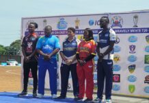 Bravely T20 Cricket Premier League Opens with $400,000 Sponsorship Boost Five athletes in colorful uniforms stand on a podium in front of a sponsor banner at a cricket event.