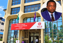 SLCB Becomes First Indigenous Bank in Sierra Leone to Secure ISO/IEC 27001:2022 Certification Facade of Sierra Leone Commercial Bank building with red signage, flags, and people outside; circular inset of a man in a blue suit.