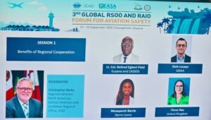 Backdrop for aviation safety forum titled 'Benefits of Regional Cooperation' with moderator and five panelist photos.